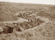 Men of the 11th Battalion, Royal Inniskilling Fusiliers in a captured German communications trench near Havrincourt during the Battle of Cambrai, November 1917.