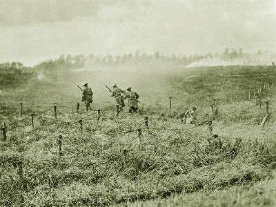  A British patrol moves through the barbed wire on the Western Front