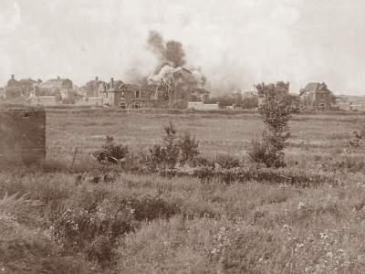 A shell bursts in the outskirts of Lens, August 1917.